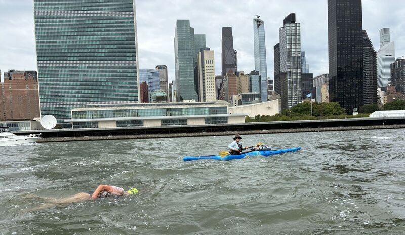 Swimming pst the United Nations - around Manhattan