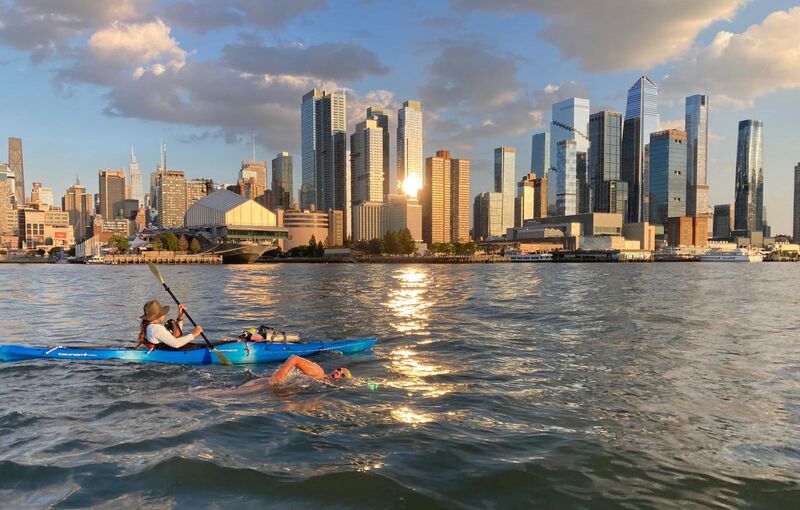 Swimming into the sunset in the Hudson with Manhattan Skyline